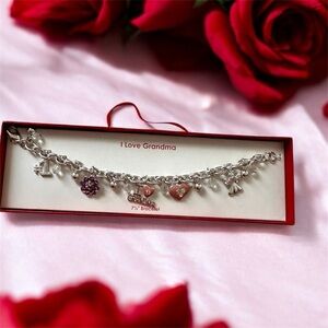 Silver Charm Bracelet with Heart and Flower Accents